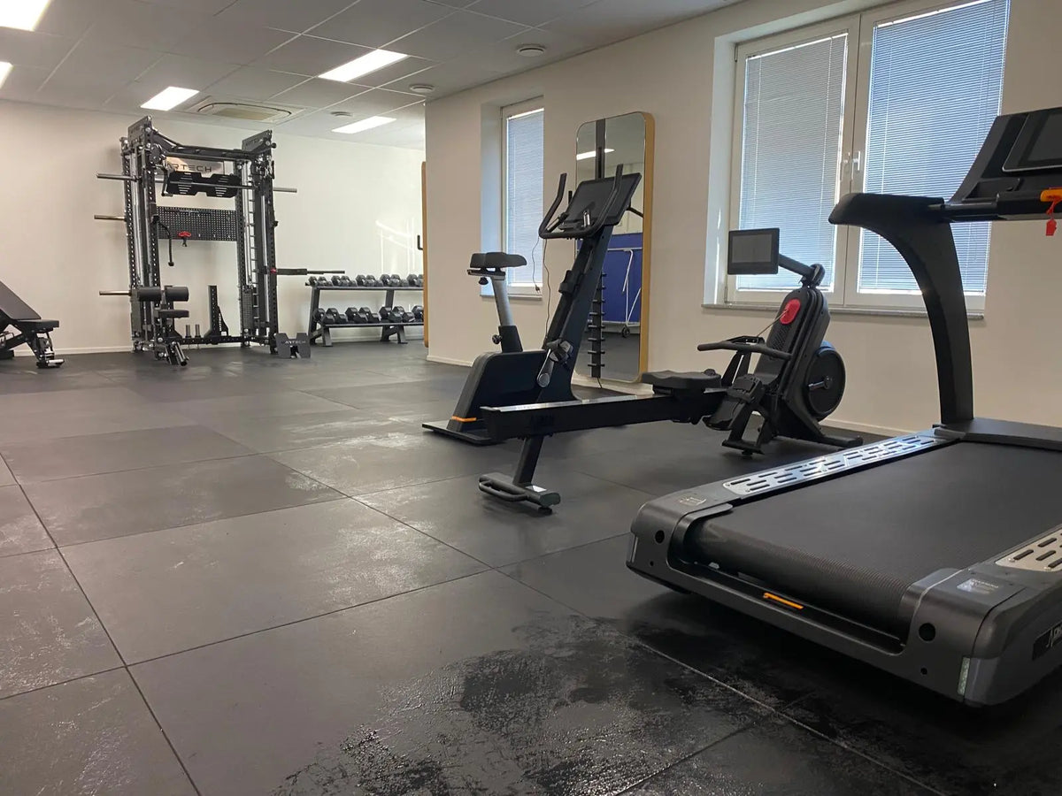 Bedrijfsfitness inrichten voor 100+ medewerkers: van lege ruimte naar volledige company gym